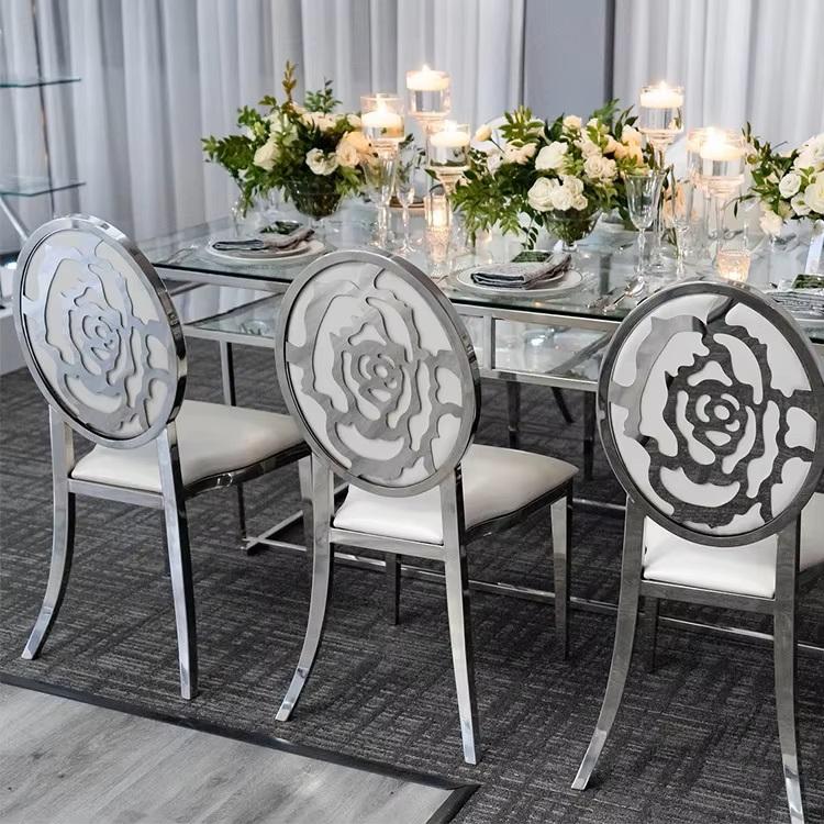 Luxury gold metal dining chairs with camellia - shaped backrest cutouts