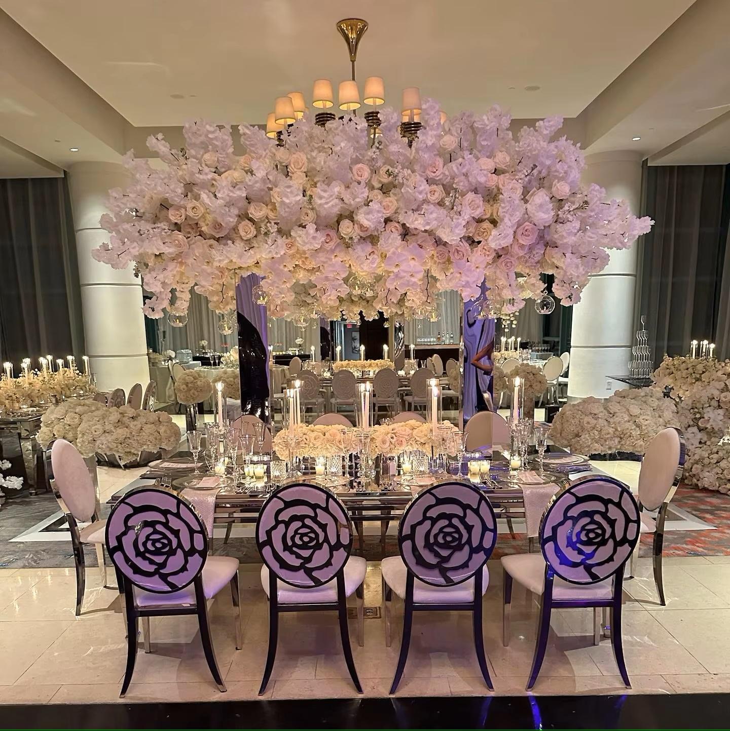 Luxury gold metal dining chairs with camellia - shaped backrest cutouts