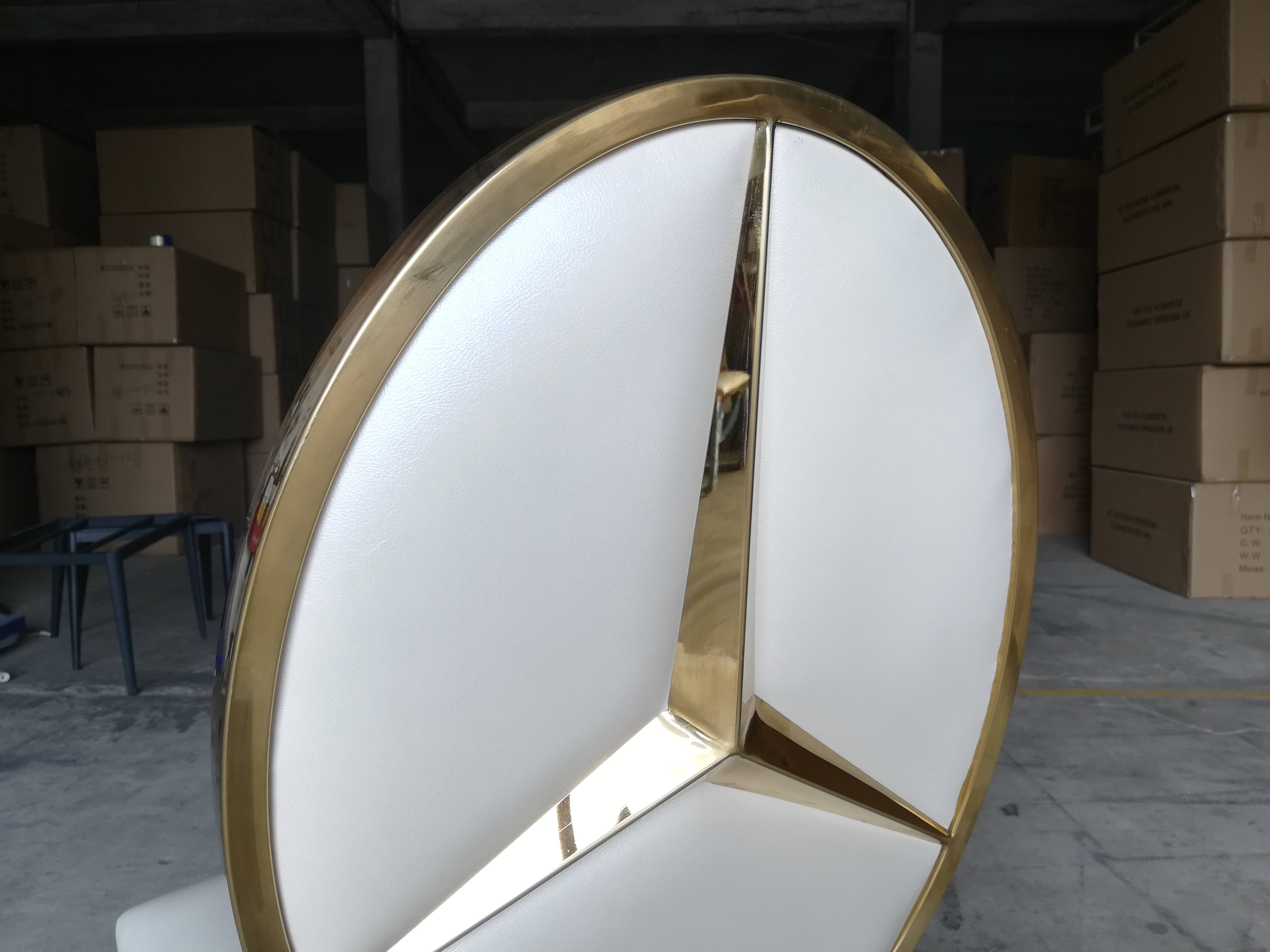 White and gold logo dining chair - luxurious oval-back upholstered chair