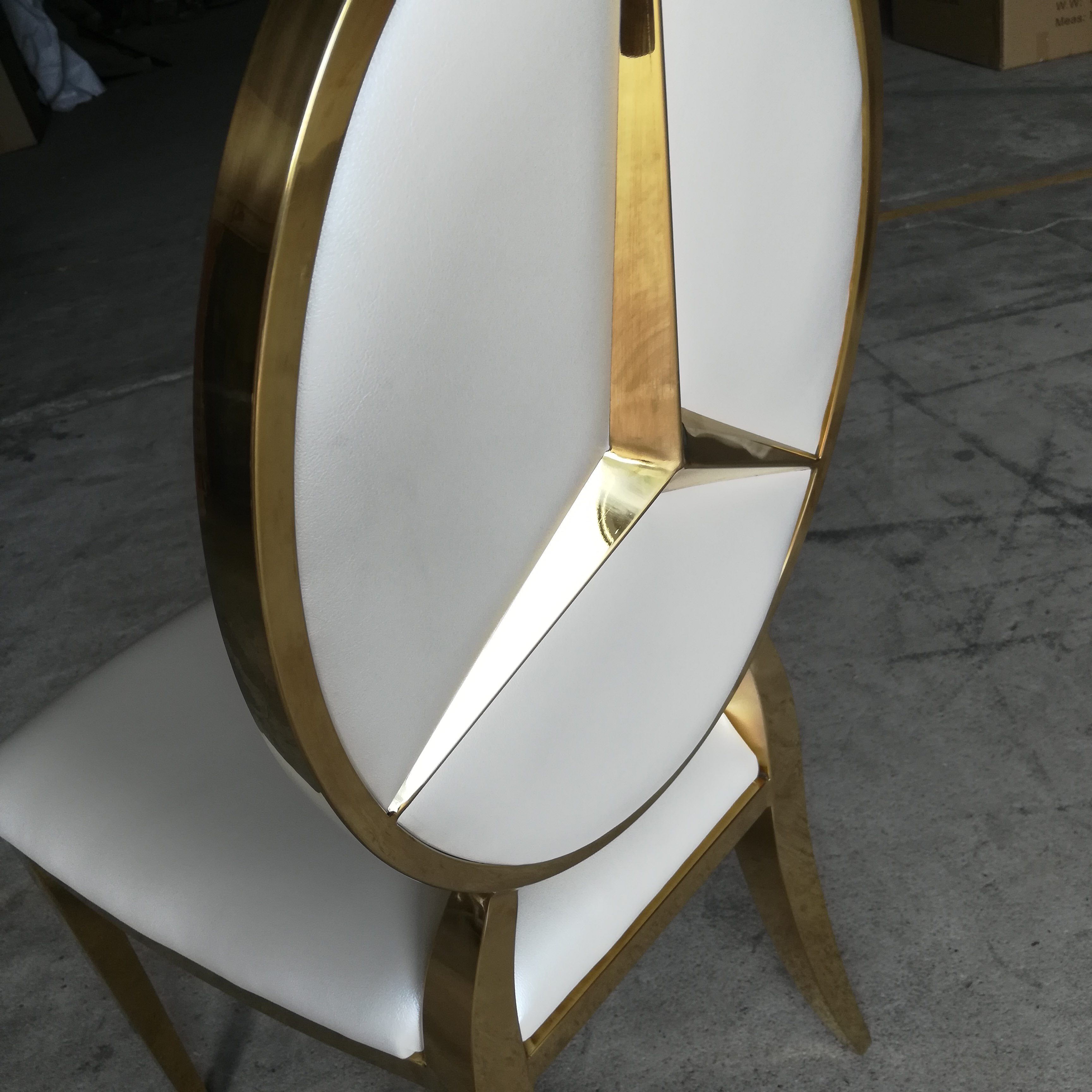 White and gold logo dining chair - luxurious oval-back upholstered chair